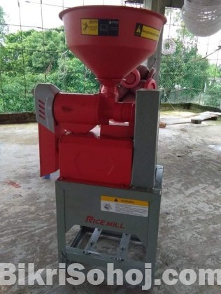 ধান ভাংগানো মেশিন